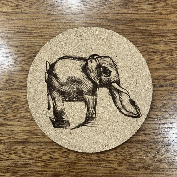 Elephant sketch on a round cork coaster