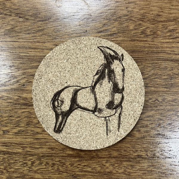 horse sketch on a round cork coaster